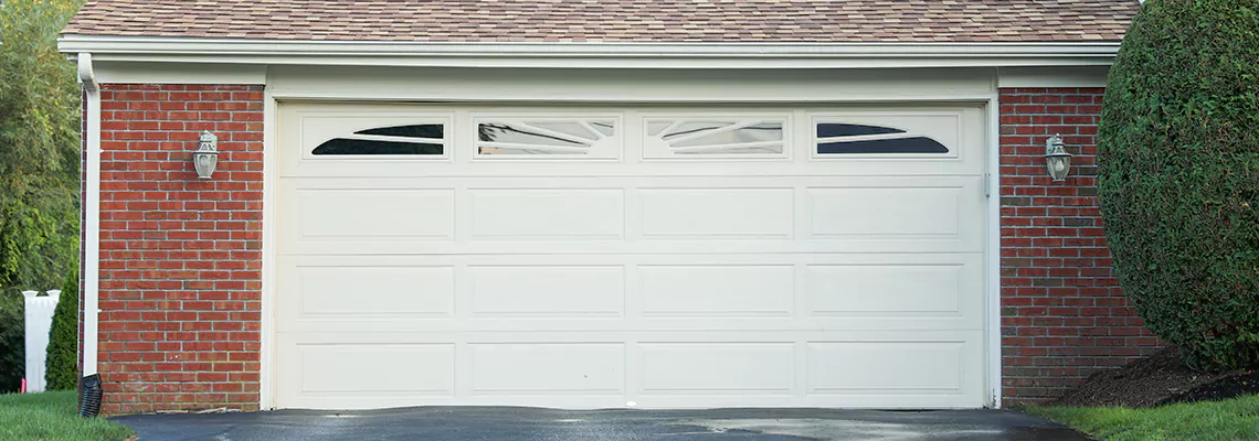 Vinyl Garage Doors Renovation in Gravenhurst, ON