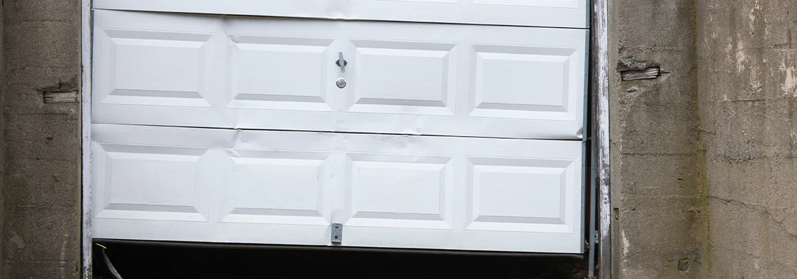 Garage Door Got Hit By A Car Dent Removal in Gravenhurst, ON