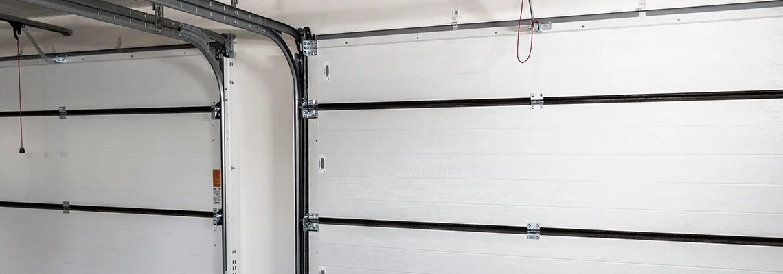 Fix Folding Garage Door Jerking in Gravenhurst, Ontario