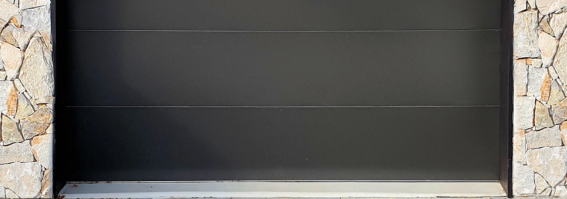 Overhead Black Garage Door Installation in Gravenhurst, Ontario